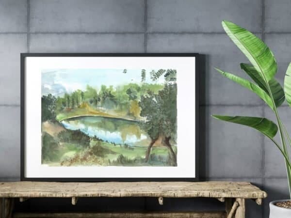 A water dam print of a lake in a wooden frame.