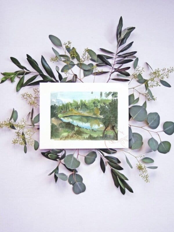 A Water dam Print with eucalyptus leaves around it.