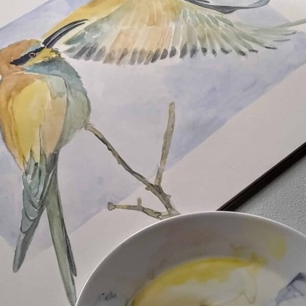 A European Bee-Eaters Print of a watercolor painting of a bird on a plate.