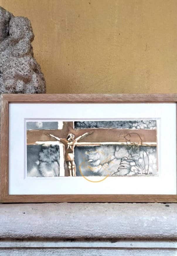 A Portugal Shop Cross Print of Jesus on the cross.