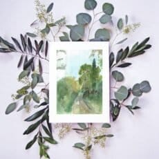 A watercolor painting with Eden leaves on a white background.