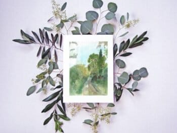 A watercolor painting with Eden leaves on a white background.